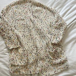 Super cute rainbow polka dot on white cardigan.